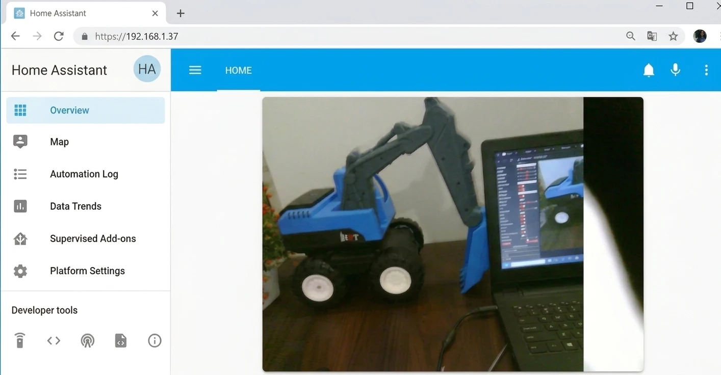 Home Assistant dashboard showing the ESP32-CAM live feed integrated as a camera card